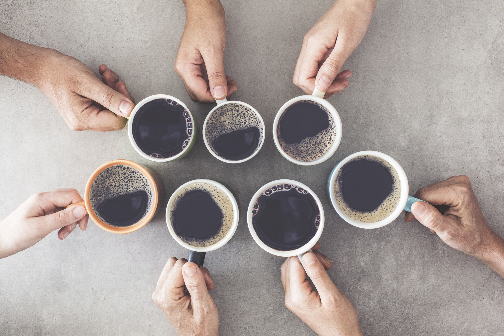 People Hands Holding Cups Of Coffee